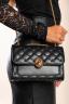 Bolso pequeño con detalle acolchado, negro