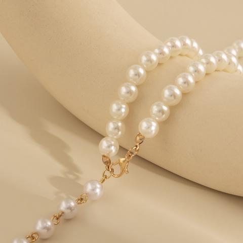 Elegante collar de perlas de imitación Montsia, color oro.