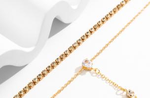 Conjunto de dos collares con diamantes de imitación, color dorado
